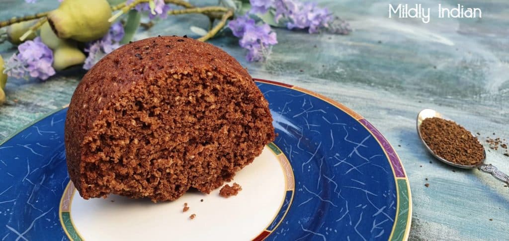 a slice of molasses cake with wattleseed.