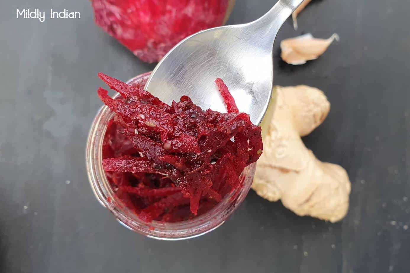 biryani achar , pickled beetroot and dates .