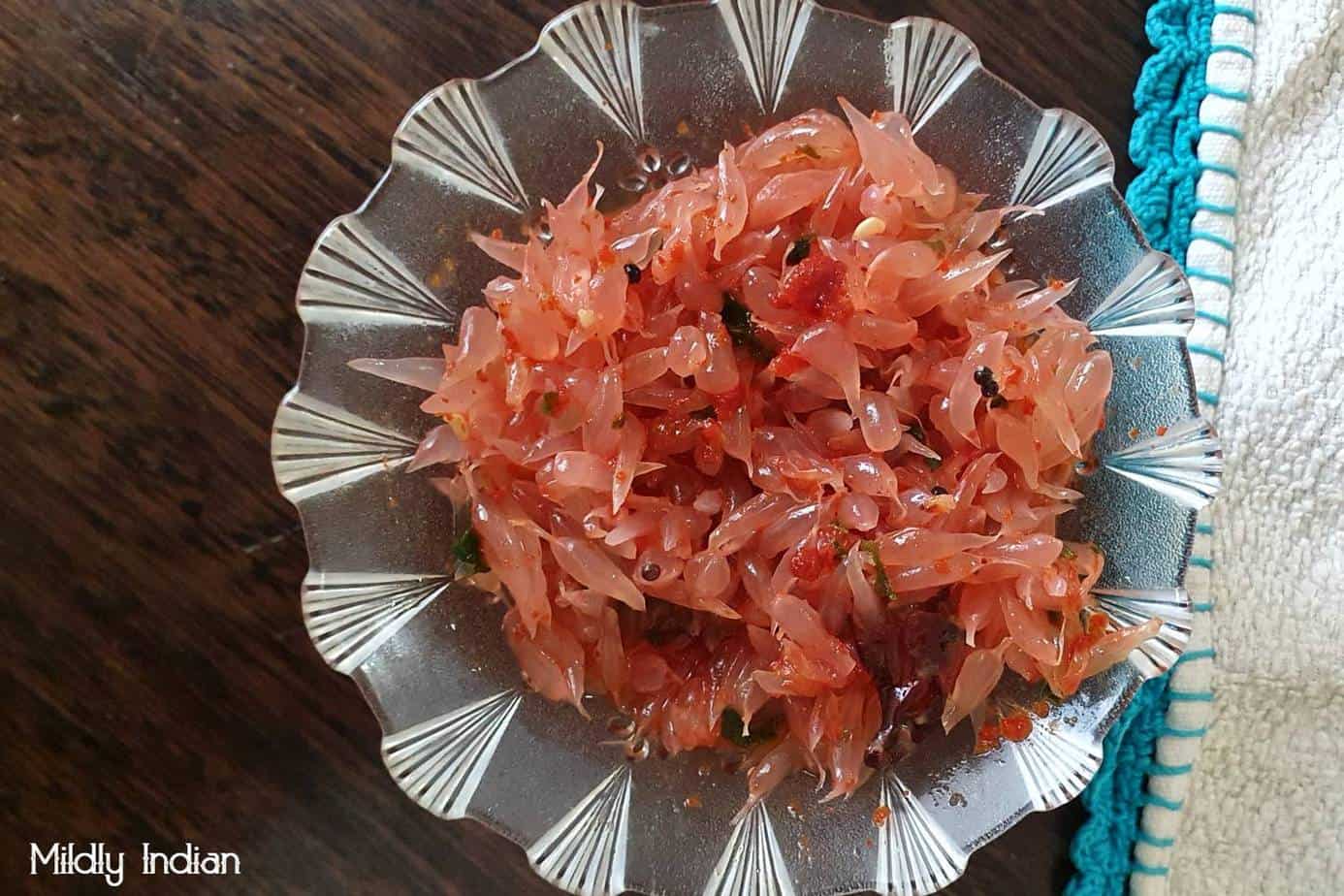 kambili naranga achar , pickled pomelo.