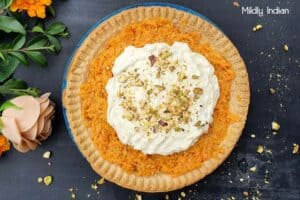 Carrot halwa tart, gajar ka halwa tart with kesar elaichi whipped cream