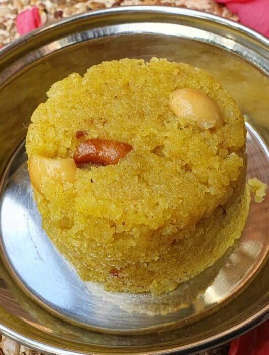 Aval kesari made with flattened rice flakes on a plate.