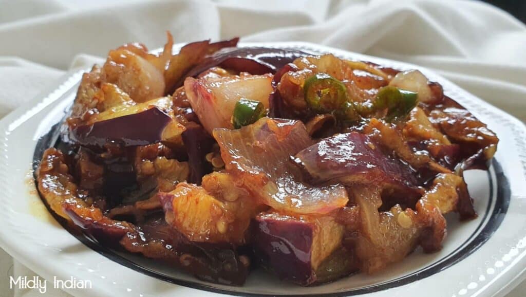 brinjal pickle with tamarind and chillies. 